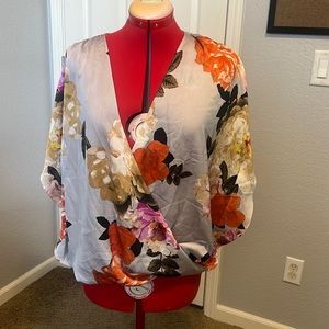 Like New. INC floral wrapped too size M. Perfect for over camis. As shown